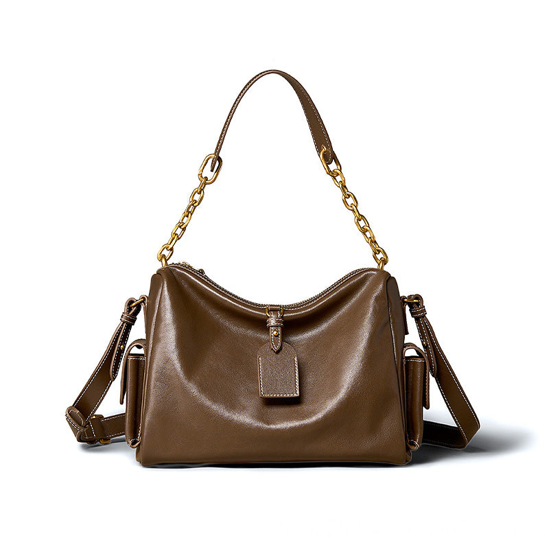 Large vegetable tanned cowhide hobo bag with chain strap and detachable shoulder strap in brown, women&