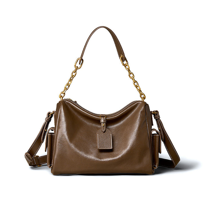 Large vegetable tanned cowhide hobo bag with chain strap and detachable shoulder strap in brown, women&