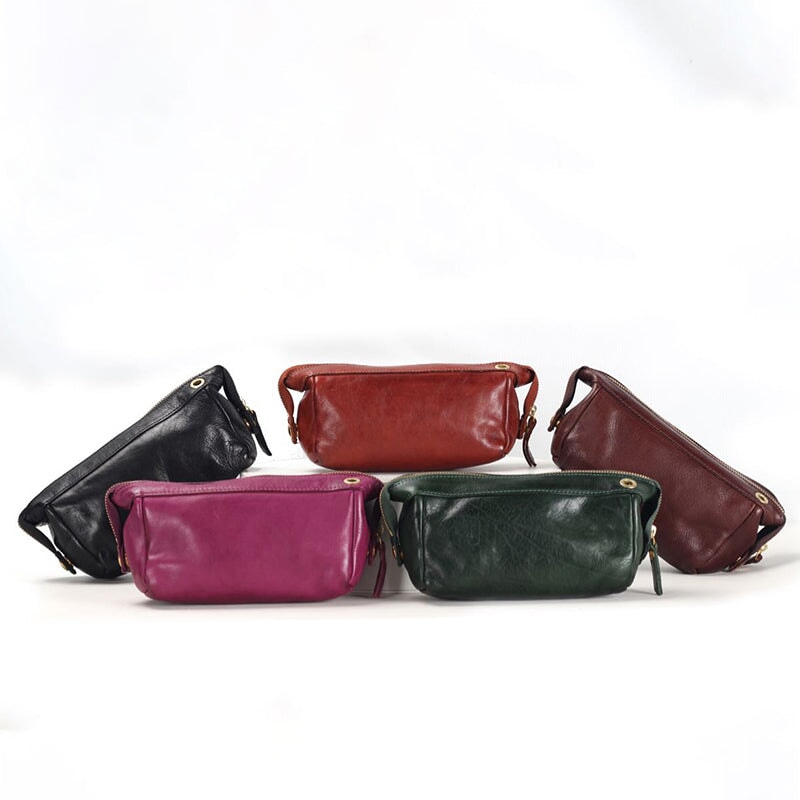 Wax vegetable tanned leather baguette bags in five colors including black and purple