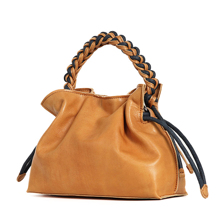 Vintage leather bucket bag in yellow with a woven handle and drawstring closure