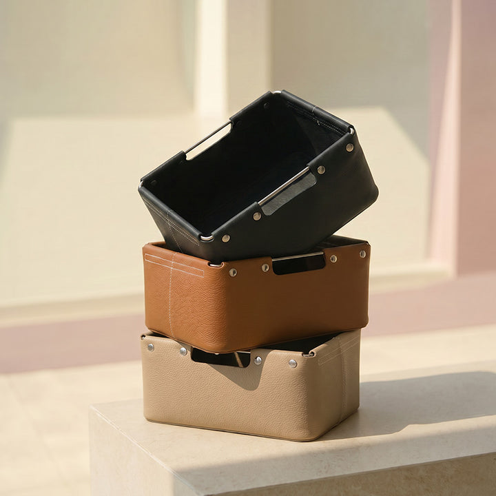 Leather desk storage baskets with metal handles stacked in black, brown and beige
