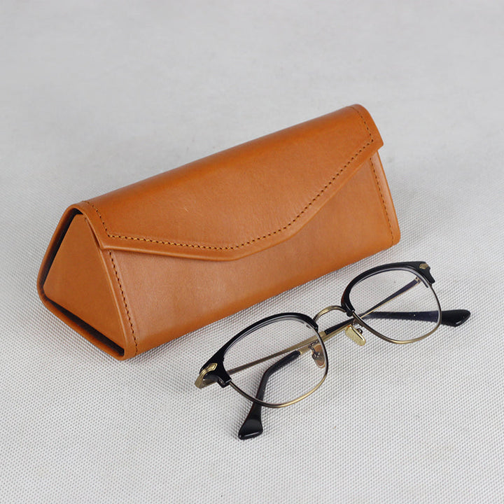 Foldable vegetable tanned leather glasses case in yellow, triangular design