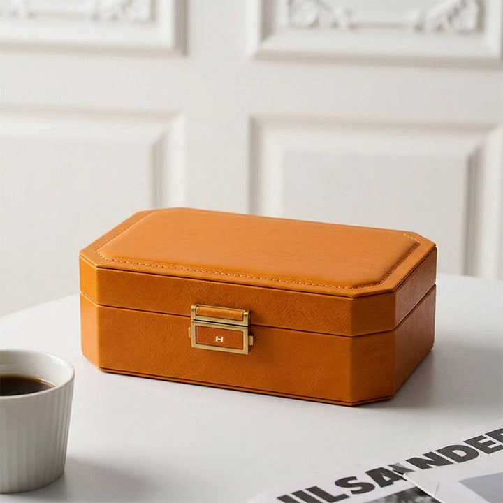 Vegetable tanned leather jewelry box with mirror and brass lock clasp, trunk style travel organizer for rings and necklaces.