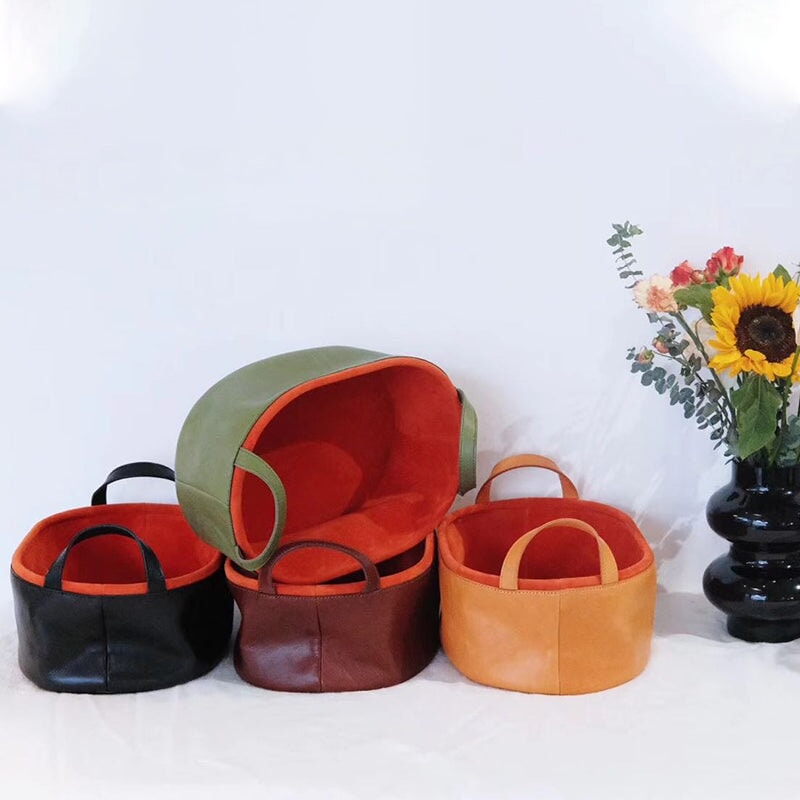 Vegetable tanned leather storage basket with dual handles