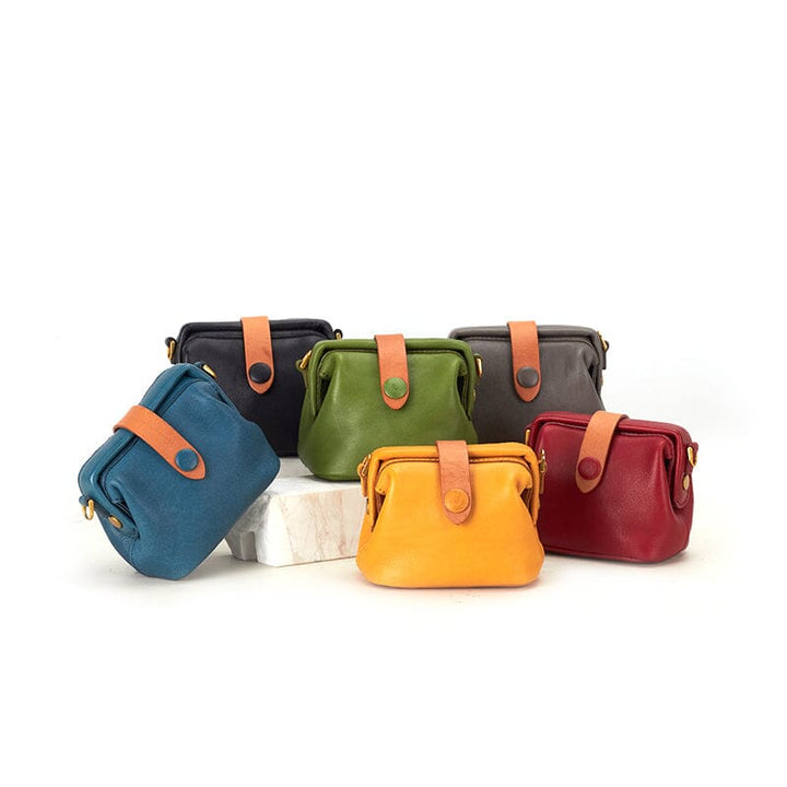 Mini leather doctor bag with gold chain strap in six colors on white background