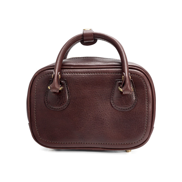 Coffee full grain leather small bowling bag with twin loop handles and brass zip, front view