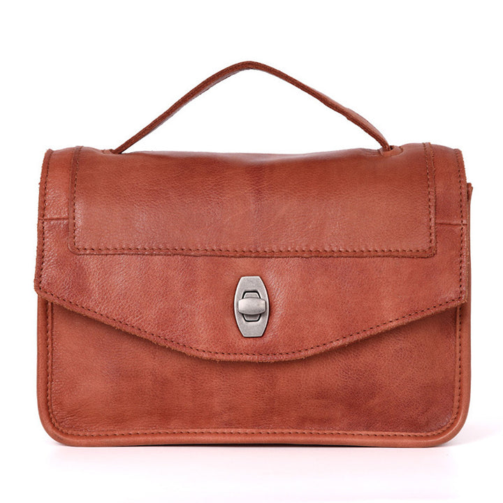 Red top grain cowhide small leather satchel bag with twist-lock closure and top handle