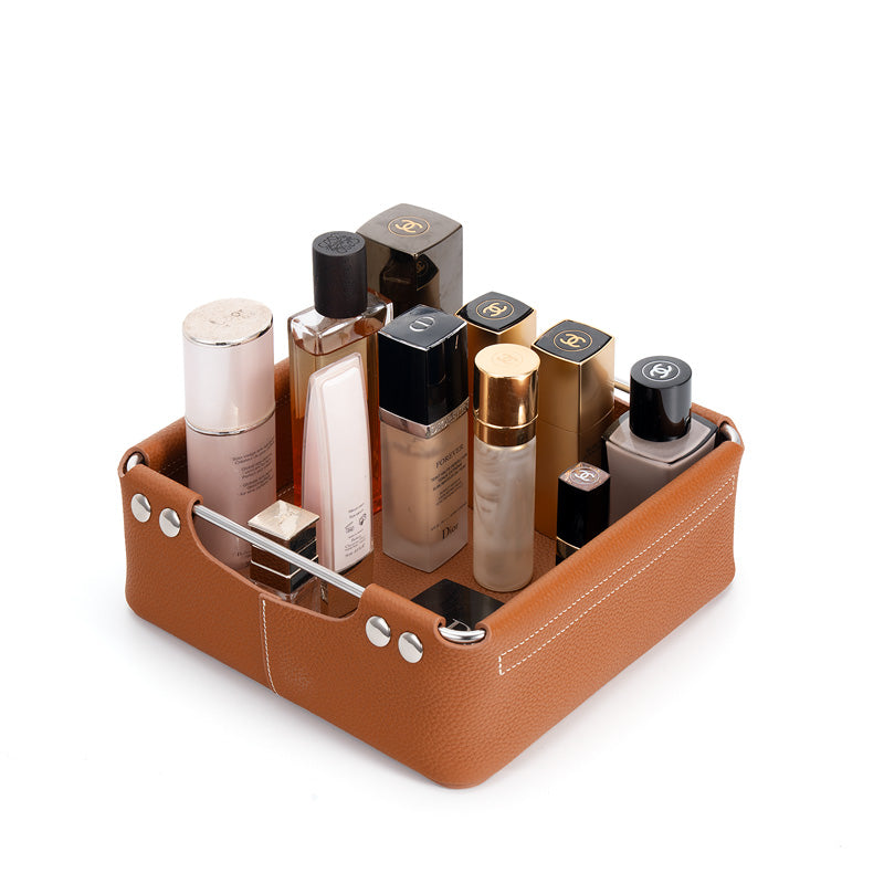 Square top grain cowhide leather storage box in brown with silver metal handle and rivets