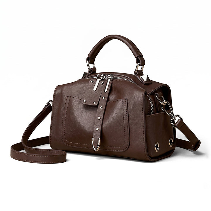 Studded vegetable tanned cowhide leather Boston bag in brown with dual detachable straps 