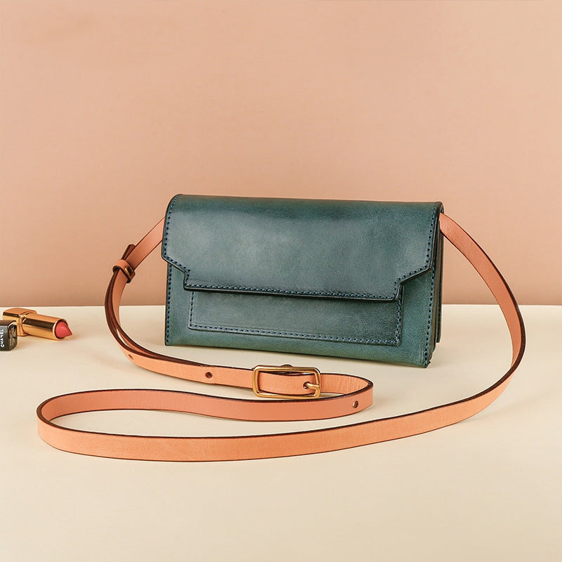 Top grain leather accordion crossbody bag for women in blue