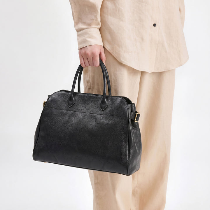 Large vegetable tanned leather Boston bag with rolled handles and detachable shoulder strap in black