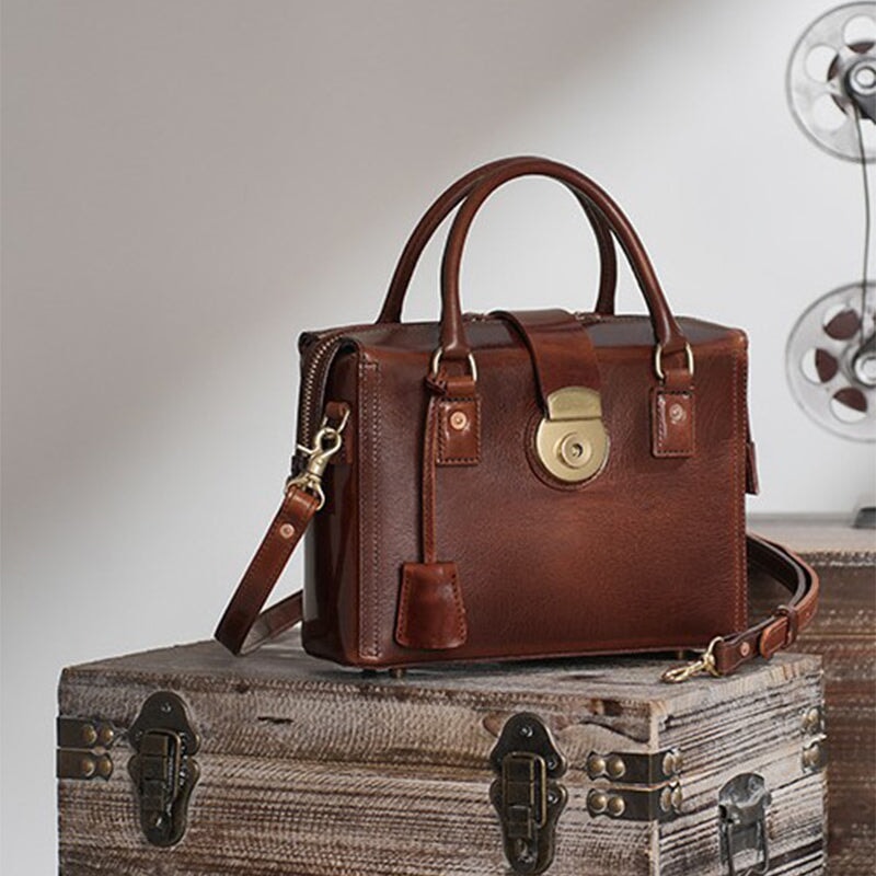 Handcrafted vegetable tanned leather doctor bag in brown with vintage frame and top handles