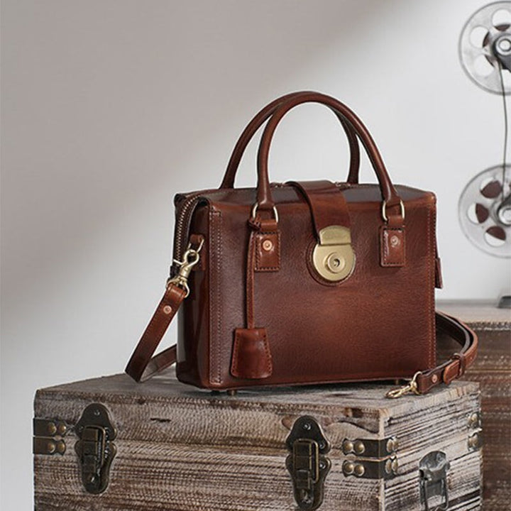 Handcrafted vegetable tanned leather doctor bag in brown with vintage frame and top handles