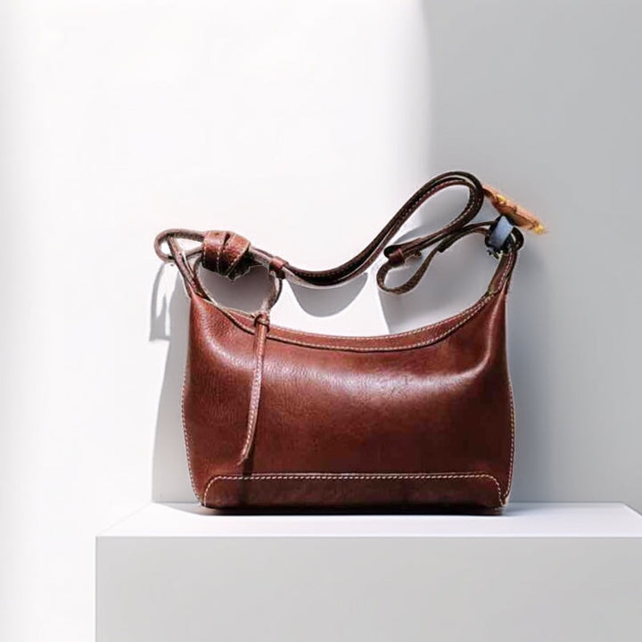 Soft slouchy vegetable tanned leather hobo bag in dark brown