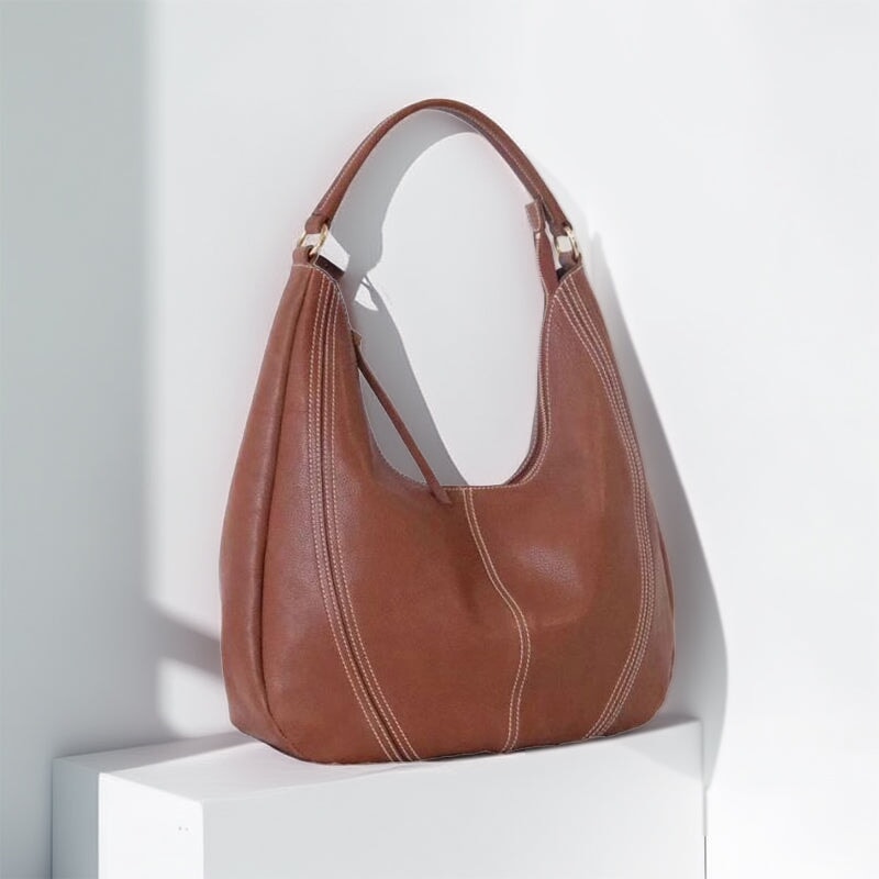 Handcrafted vegetable tanned leather hobo bag in honey brown with slouchy soft tote shoulder silhouette