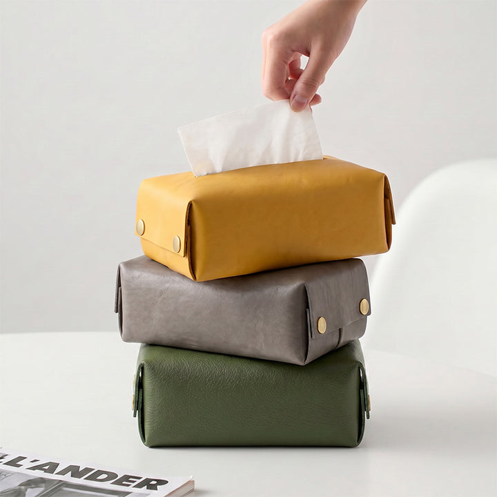 Vegetable tanned leather tissue box cover in matcha green, lemon yellow and gray, a refined desk accessory.