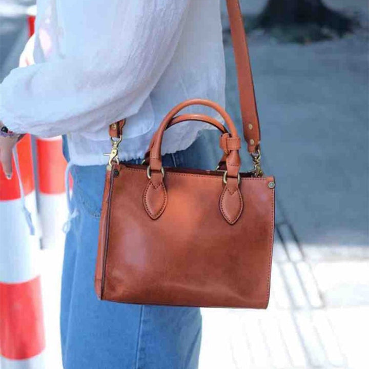 Vegetable tanned leather tote bag in honey brown with structured square silhouette