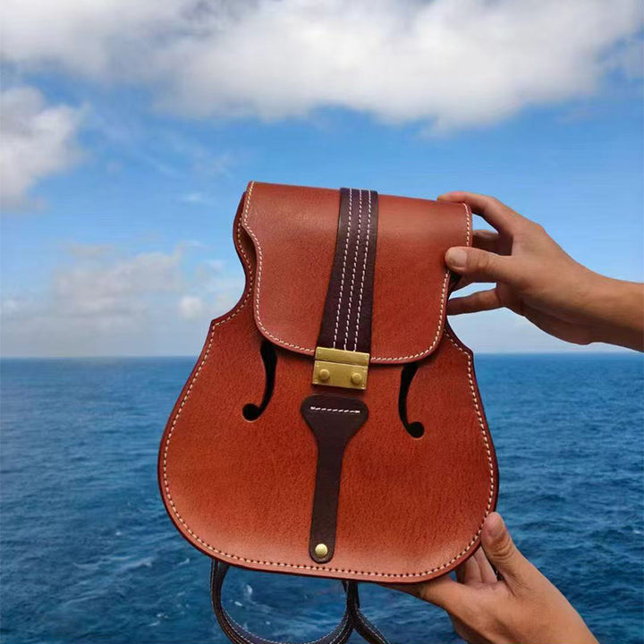 Violin shaped leather backpack in brown vegetable tanned cowhide