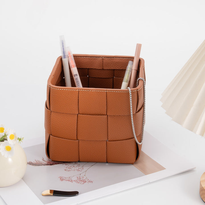 Handcrafted woven leather basket in brown, square open-top desktop organizer