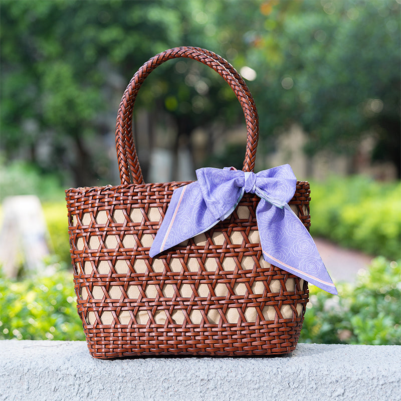 Handmade open weave leather tote bag in brown cowhide with sturdy top handles