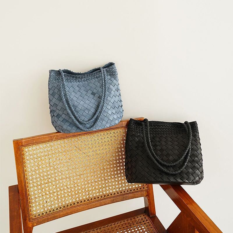 Handwoven Italian sheepskin leather tote bagwith open top bucket silhouette and shoulder handles