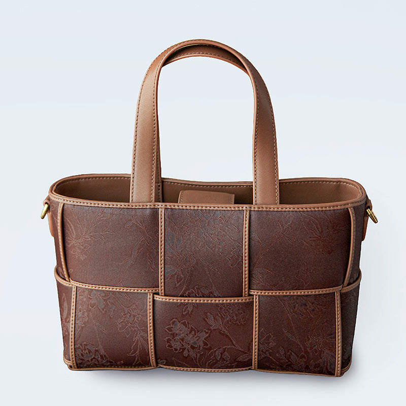 Coffee brown Xiangyunsha silk brocade tote bag with leather top handles and checkerboard weave panel