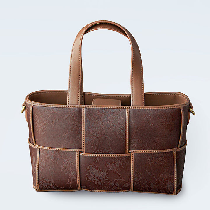 Coffee brown Xiangyunsha silk brocade tote bag with leather top handles and checkerboard weave panel