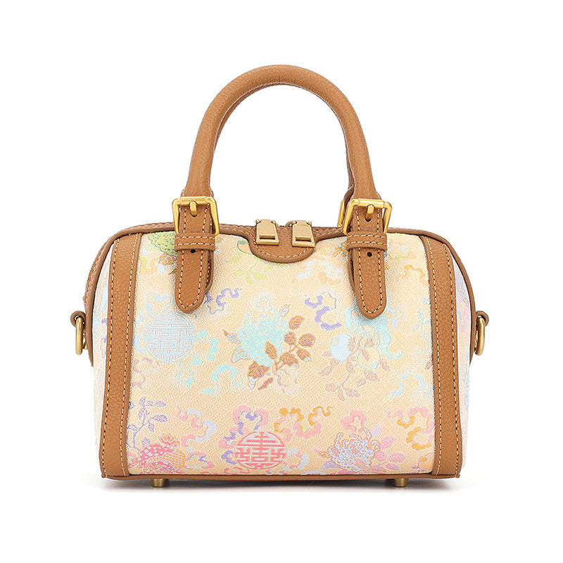 Yellow cowhide Boston bag with Song Brocade Sanduo motif